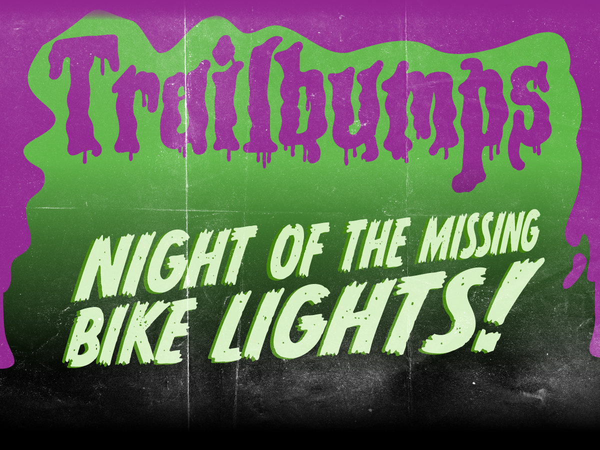 Illustration of purple slime overlaying ominous green and black background with the words, 'Trailbumps' - 'NIGHT OF THE MISSING BIKE LIGHTS!'