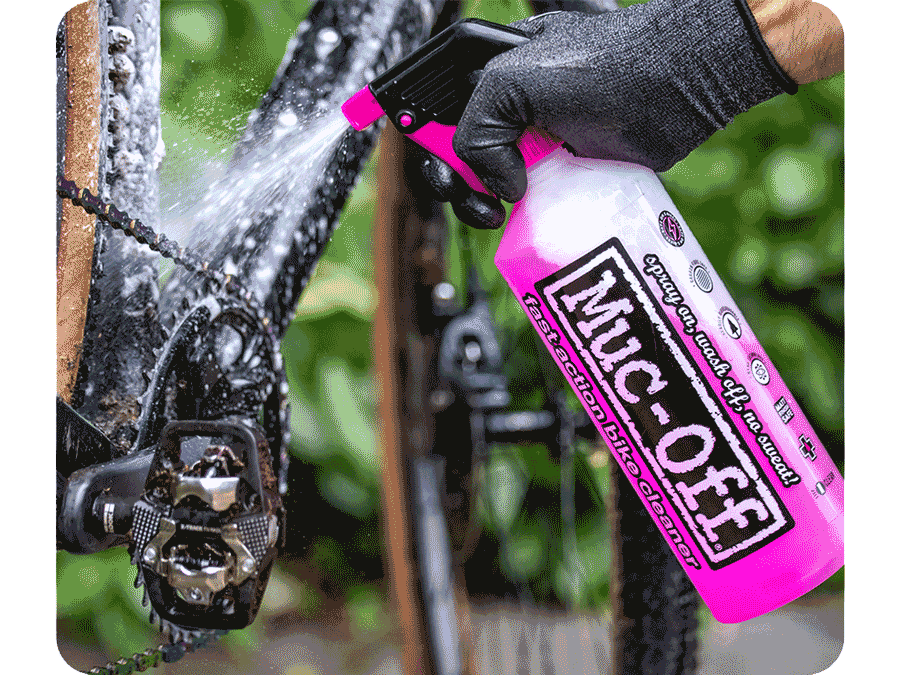 Close up of a black and white Trek Bicycle being washed