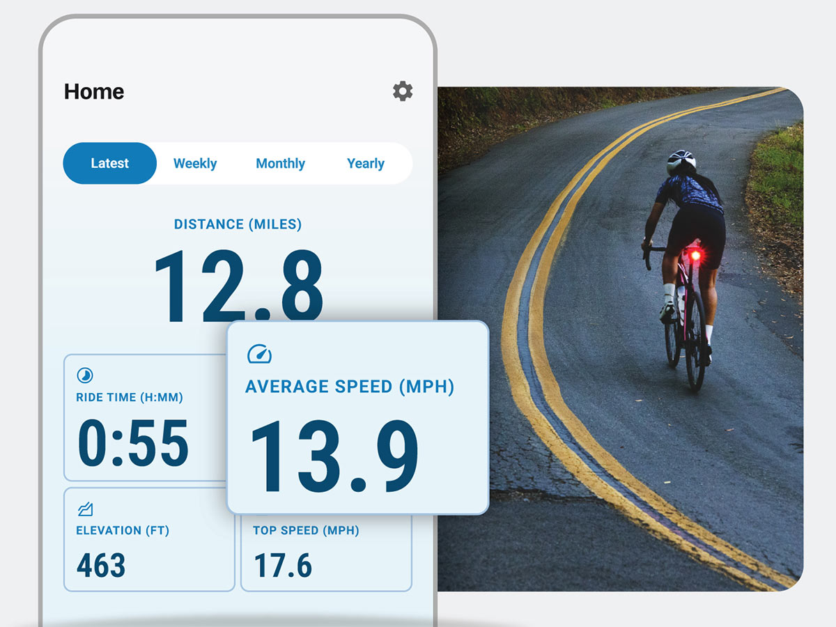 Ride data app screen with cyclist wearing helmet while riding bike with daytime running light