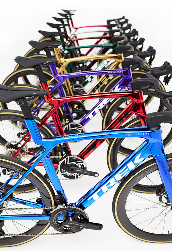 Project One bikes with Chroma paint scheme in various colors stacked one in front of the other